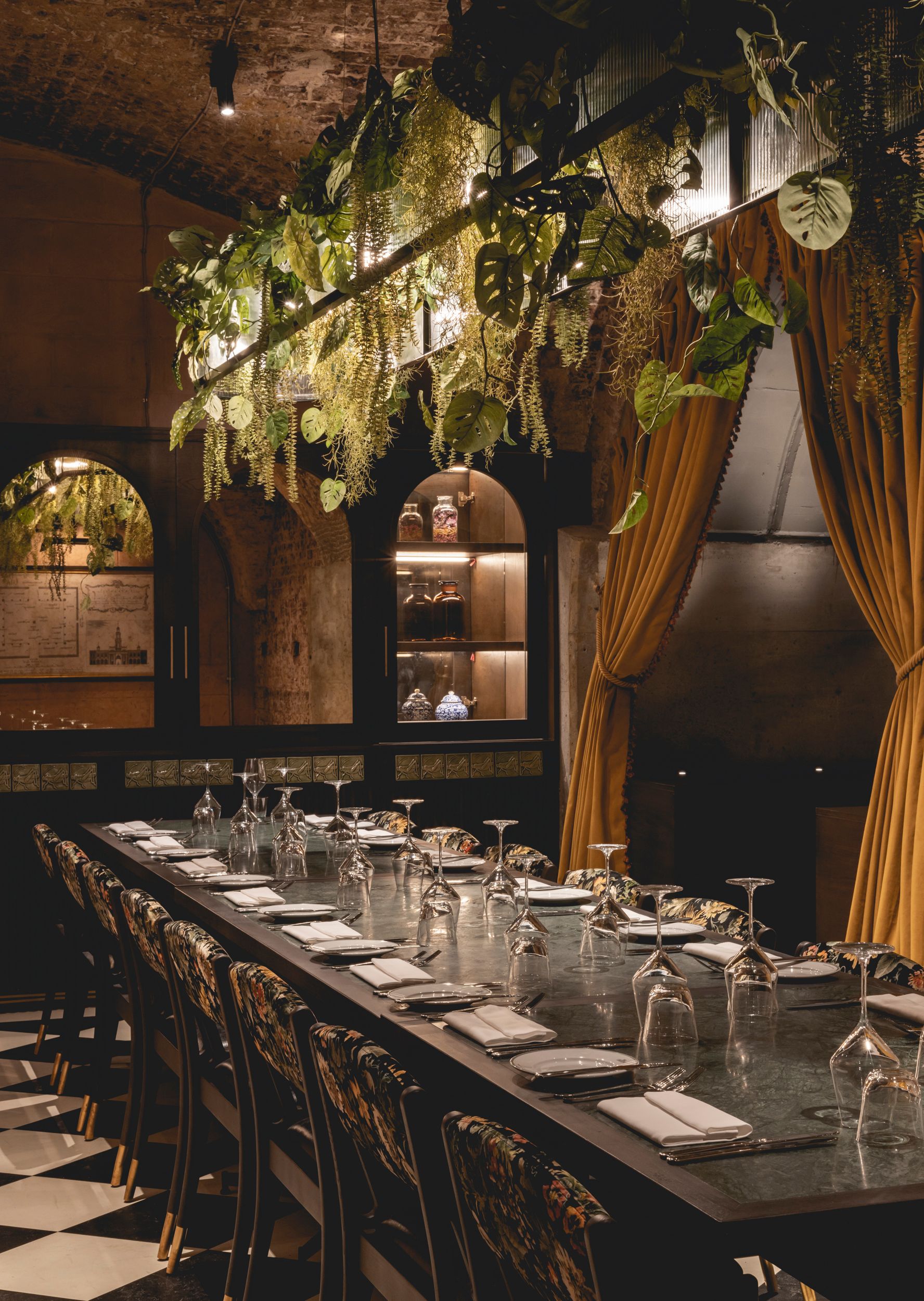 Private dining room in restaurant with table set.